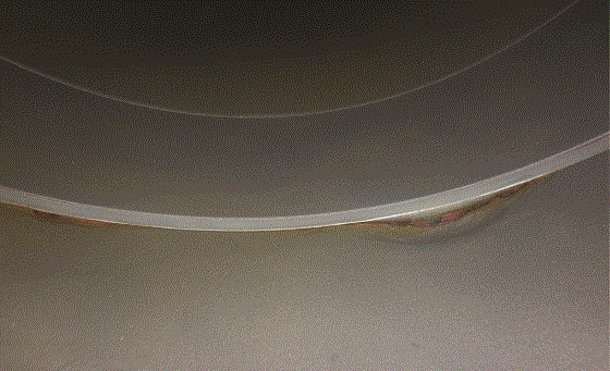 FIGURE 3 Illustration of the corrosion observed at the pipe/isolating material interface, at the  4 and 8 o’clock positions.