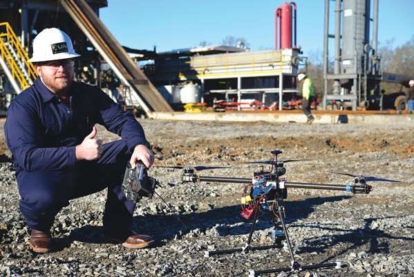 Ryan Pullen with UAI readies a drone for takeoff. Photo courtesy of UAI.