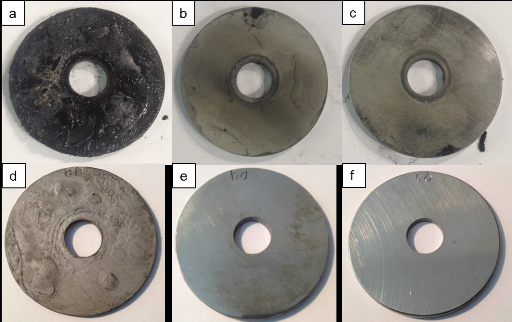 Photographs of the disk specimens after testing for four weeks before cleaning (top row) and after cleaning (bottom row): (a, d) CS, (b, e) UNS S31603, and (c, f) UNS S31803. Photos courtesy of Sigrún Nanna Karlsdóttir.
