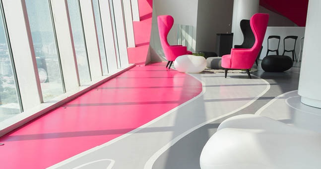 Epoxies are a popular floor choice for customer-facing areas that must look good on top of being functional. Photo courtesy of Flowcrete Group.