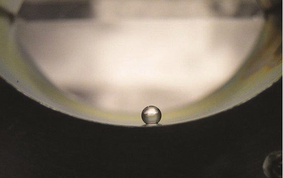 A water droplet on the inside surface of a coated pipe illustrates the hydrophobicity of the coating. Image courtesy of Southwest Research Institute.
