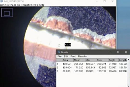 FIGURE 4 Using a Tooke gauge: (a) graduation scale (by courtesy of Industrial Physics), (b) recording finding using a smartphone digital camera.