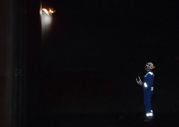One of the surveyors pilots the UAV inside a cargo tank on the MV <i>Apollo</i>. Photo courtesy of DNV-GL. 