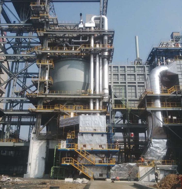 FIGURE 1 The structures pictured consist of the charging crane, cooling chamber, boiler, and primary dust catcher of the coke dry quench (CDQ) system. Photo courtesy of Tata Steel—Kalinganagar—Orissa—India.
